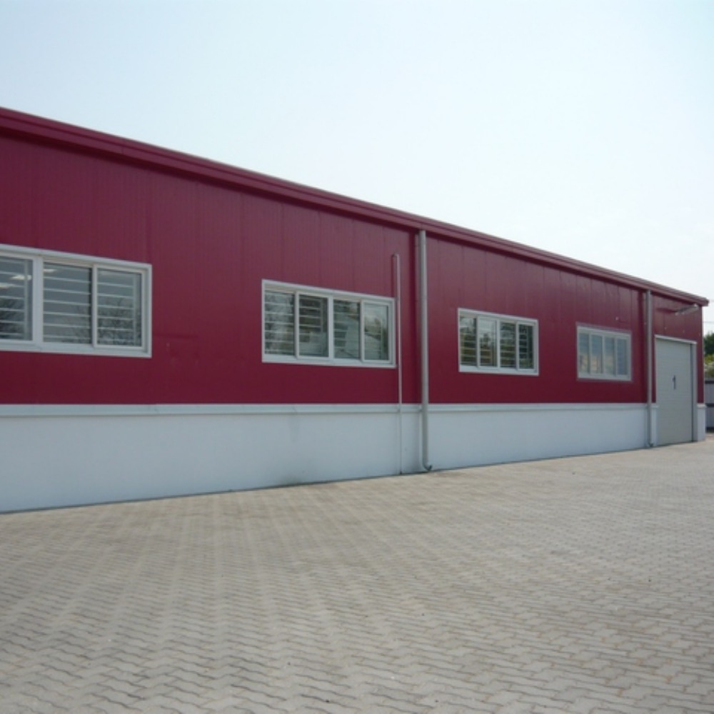 Bâtiment industriel d'entrepôt de structure métallique de cadre portail préfabriqué Q355 galvanisé à chaud de grande envergure